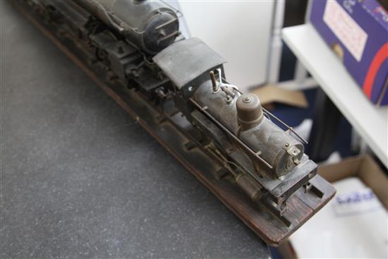 A scratchbuilt model of a 262 steam powered locomotive and tender,